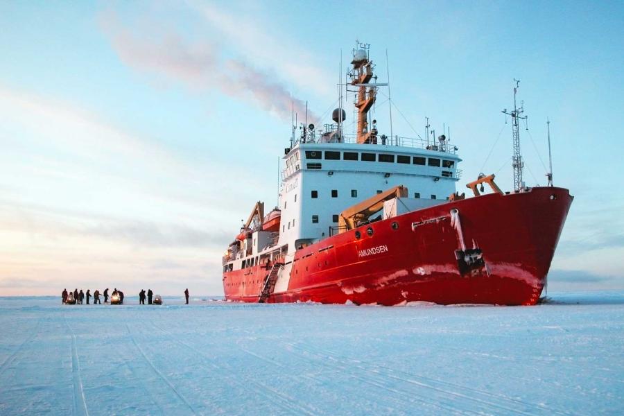 A research icebreaker ship, the CCGS Amundsen, breaking through arctic sea ice.